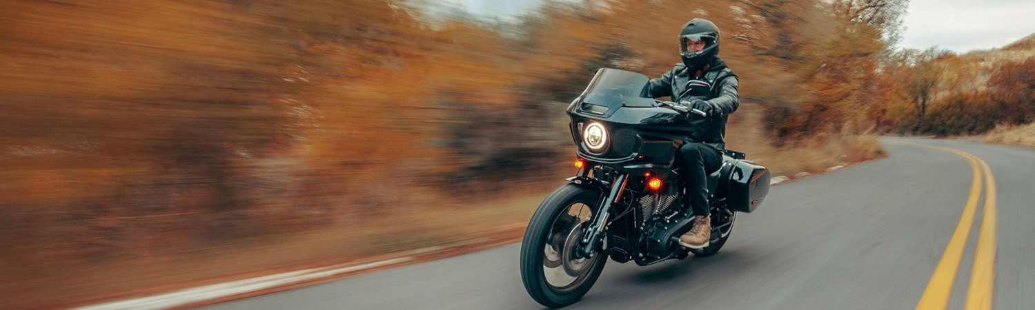 A man riding a top-tier, well-maintained used Harley-Davidson motorcycles in San Antonio, TX